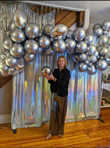 Silver garland and holographic backdrop